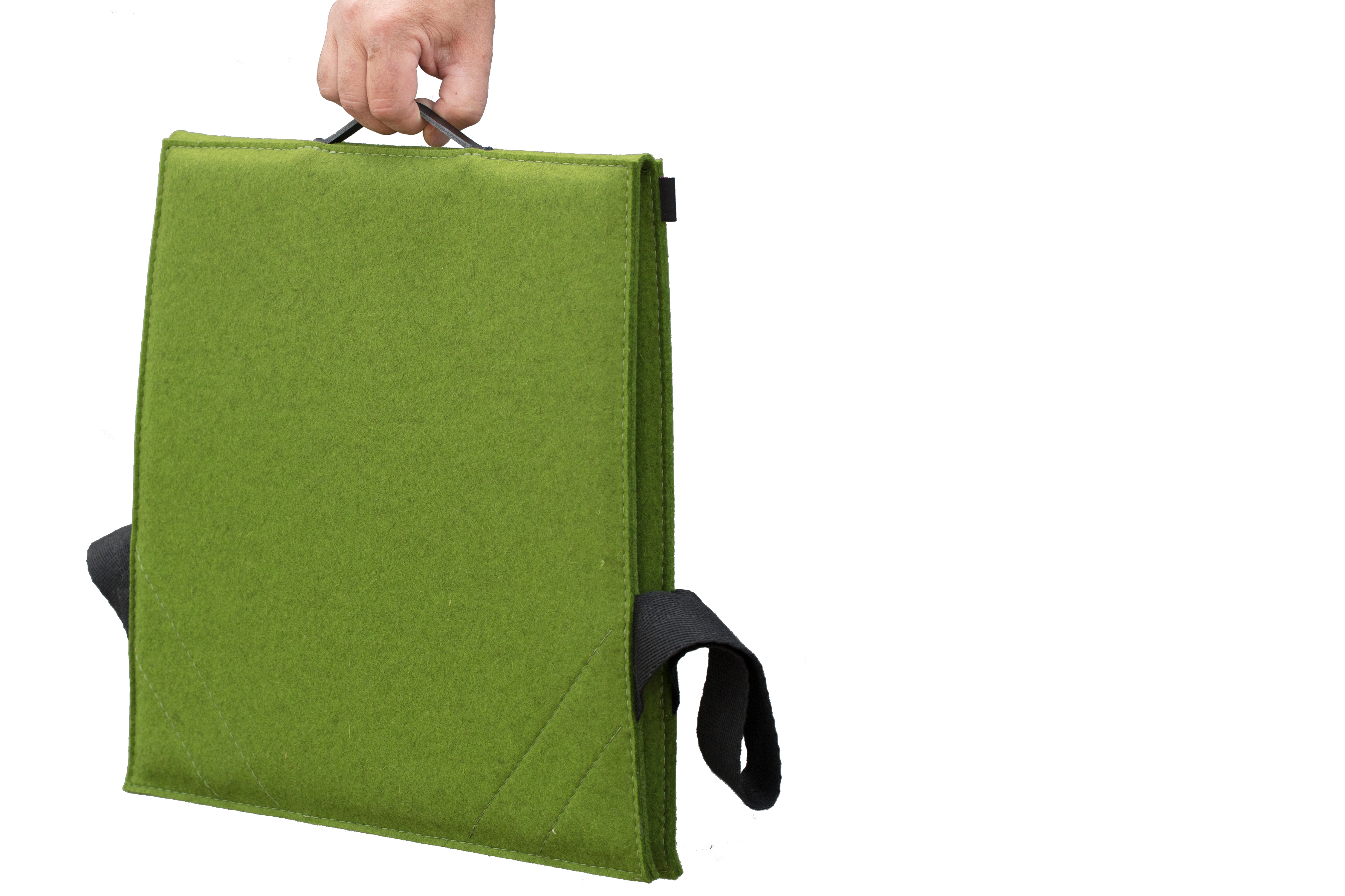 Fold ud stol i grøn filt i auditorium